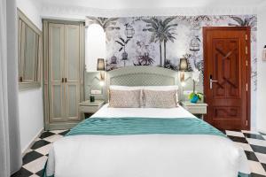 Posteľ alebo postele v izbe v ubytovaní Hotel Boutique Las Almenas