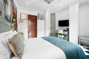 Televízia a/alebo spoločenská miestnosť v ubytovaní Hotel Boutique Las Almenas