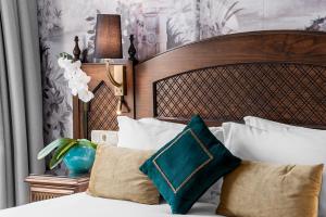 Posteľ alebo postele v izbe v ubytovaní Hotel Boutique Las Almenas