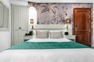 Posteľ alebo postele v izbe v ubytovaní Hotel Boutique Las Almenas