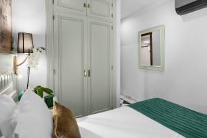 Posteľ alebo postele v izbe v ubytovaní Hotel Boutique Las Almenas