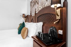 Posteľ alebo postele v izbe v ubytovaní Hotel Boutique Las Almenas