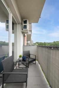 Balkon ili terasa u objektu Podgórze Air-Conditioned Family Apartment with Parking by Renters