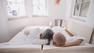 Ein Bett oder Betten in einem Zimmer der Unterkunft ALPHAtauern Health Resort - Adults Only 15 plus