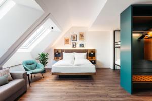 Ein Bett oder Betten in einem Zimmer der Unterkunft Hotel Schani UNO City