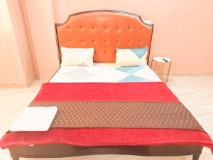 Llit o llits en una habitació de Hotel Rose Inn - Dwarka Sec 8