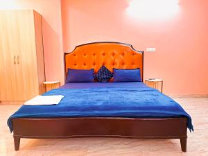 Un ou plusieurs lits dans un hébergement de l'établissement Hotel Rose Inn - Dwarka Sec 8