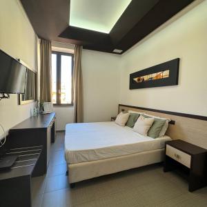 Letto o letti in una camera di Boteco B&B