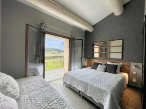 Ένα ή περισσότερα κρεβάτια σε δωμάτιο στο LA BASTIDE 5 étoiles Spa Saint Quenin Vaison - Pisicine - Jacuzzi Hammam MONT VENTOUX PROVENCE +36 φωτογραφίες