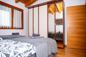 Ένα ή περισσότερα κρεβάτια σε δωμάτιο στο Residence Stradella Verde