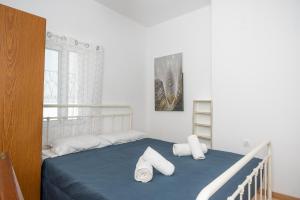 Posteľ alebo postele v izbe v ubytovaní Islanders Yard Apartments