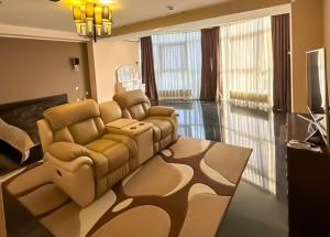 TV a/nebo společenská místnost v ubytování Mark Plaza Hotel