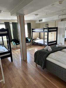 Postel nebo postele na pokoji v ubytování Tune Hotell Sarpsborg + 13 fotografií