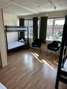 Letto o letti in una camera di Tune Hotell Sarpsborg