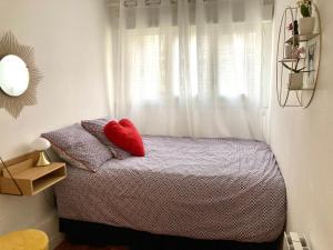 Ένα ή περισσότερα κρεβάτια σε δωμάτιο στο Appartement familial avec terrasse et parking