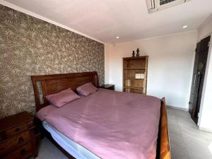 Gulta vai gultas numurā naktsmītnē Executive apartment - Oranjestad