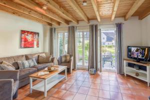 Foto dalla galleria di Ostseeferienpark Seepferdchen direkt an der Ostsee - perfekt für Familien a Ostseebad Nienhagen Altre 46 foto