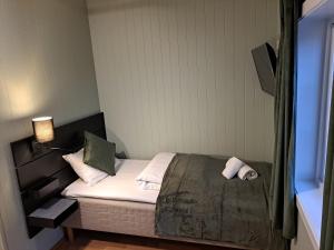 Letto o letti in una camera di Tune Hotell Sarpsborg