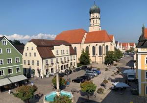 an aerial view of a town with a clock tower at Ferienwohnung "beim Schrimpf" in Schongau