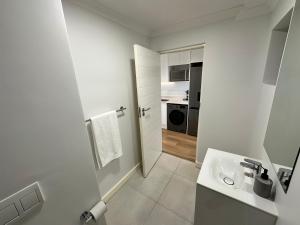 Kuchyň nebo kuchyňský kout v ubytování Newlands Peak Apartments