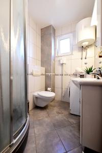 Koupelna v ubytování Apartment MS124, Promajna