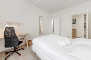 Giường trong phòng chung tại Le Monet - Grand logement hyper centre