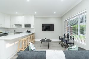 Η κουζίνα ή μικρή κουζίνα στο 9 On Oak Luxury One Bedroom