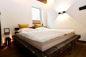 Ένα ή περισσότερα κρεβάτια σε δωμάτιο στο Strand Chalet +17 φωτογραφίες