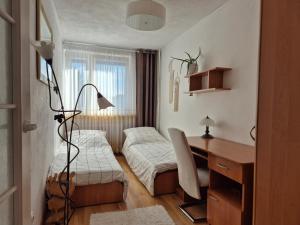Galería fotográfica de Przytulny apartament blisko MOLO GIŻYCKO en Giżycko 1 fotos más