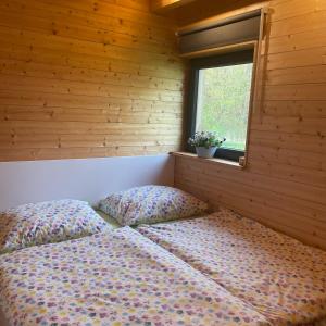 Krevet ili kreveti u jedinici u okviru objekta RESORT SALIXA u Poděbrad