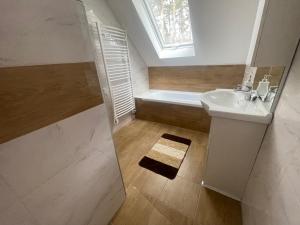 Koupelna v ubytování Grátisz Apartman Siófok + 37 fotografií