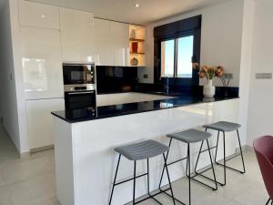 Kuchnia lub aneks kuchenny w obiekcie Elegante apartamento en Jardines de Montesolana