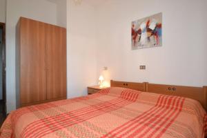 A bed or beds in a room at Annarosa