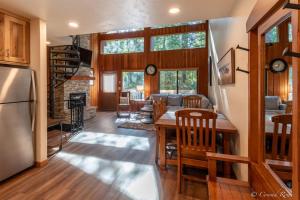 a kitchen and living room with a table and a dining room at 93 Big Prairie in Whitefish