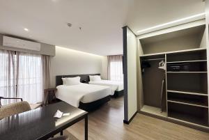 Radisson São Paulo Paulista客房内的一张或多张床位