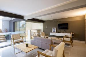Μια τηλεόραση ή/και κέντρο ψυχαγωγίας στο Upper Pardo Apartments