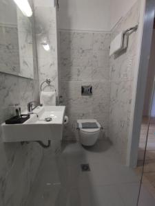 A bathroom at Tina Hotel