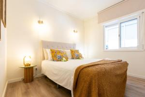 Ένα ή περισσότερα κρεβάτια σε δωμάτιο στο BEACHOME4u 5