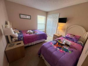 Una cama o camas en una habitación de TAG Tranquility Vacation Home - Golf course view 41 fotos más