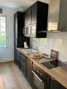 A cozinha ou cozinha compacta de The Cap - Charming apartment