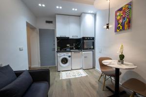 Kjøkken eller kjøkkenkrok på Niki’s Apartments