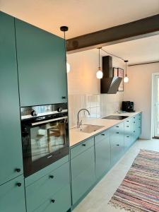 Kuchyň nebo kuchyňský kout v ubytování Fantastic holiday apartment - Asta