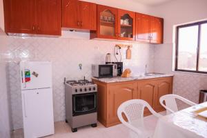 Una cocina o cocineta en Escape House