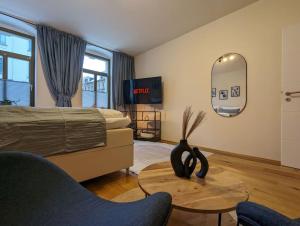 Postel nebo postele na pokoji v ubytování Royal Apart Chemnitz 1 - Terrasse nahe Zeisigwald + 16 fotografií