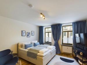 Postel nebo postele na pokoji v ubytování Royal Apart Chemnitz 1 - Terrasse nahe Zeisigwald