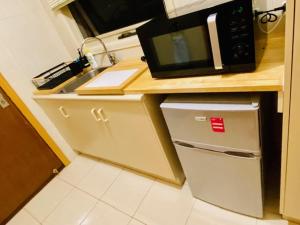Kuchyň nebo kuchyňský kout v ubytování Cloud 9 Guest Suite