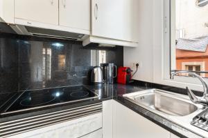 Cucina o angolo cottura di Lodging Apartments Barceloneta Beach Studio 12