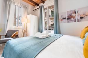 Letto o letti in una camera di Lodging Apartments Barceloneta Beach Studio 12
