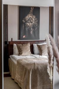 Postel nebo postele na pokoji v ubytování xhotel