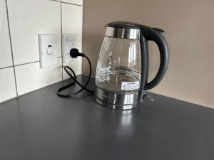 a blender sitting on top of a counter at Rest & Relax Units in Whangarei